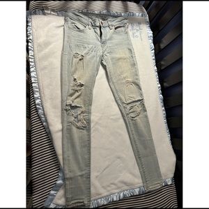 A&E light washed distressed jegging size 2
